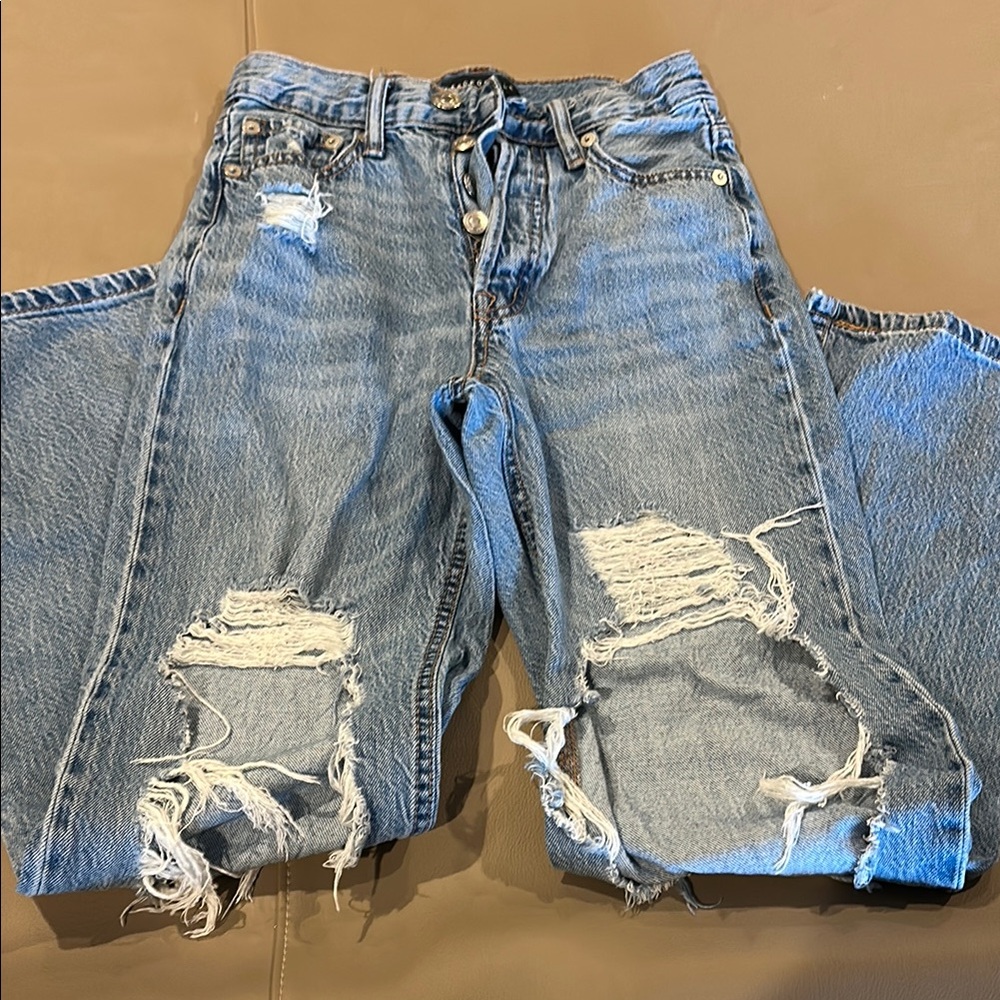 Women's Distressed Blue Jeans